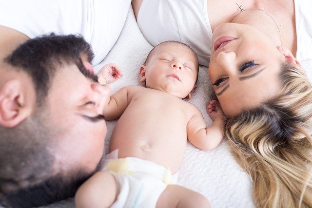 Happy family with baby _ IVF alternative
